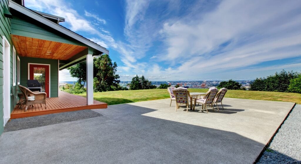 Backyard patio with city and water views