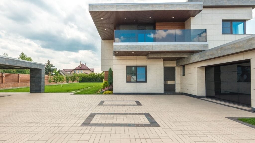 Modern two-storey home with large paved driveway